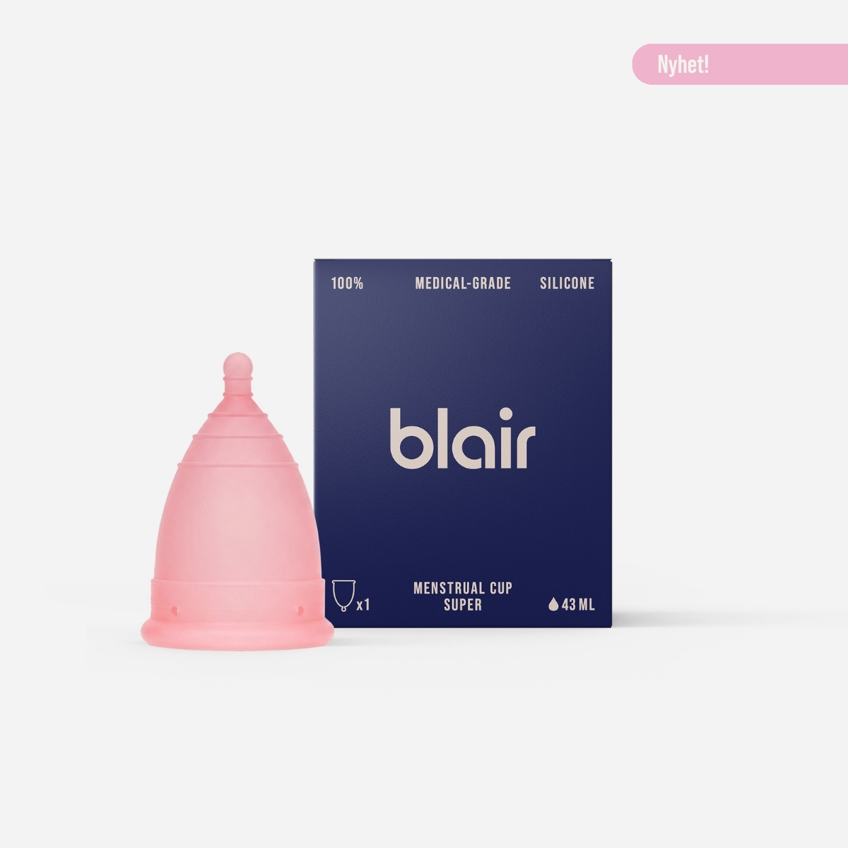 En Blair-förpackning med en menskopp på en grå bakgrund